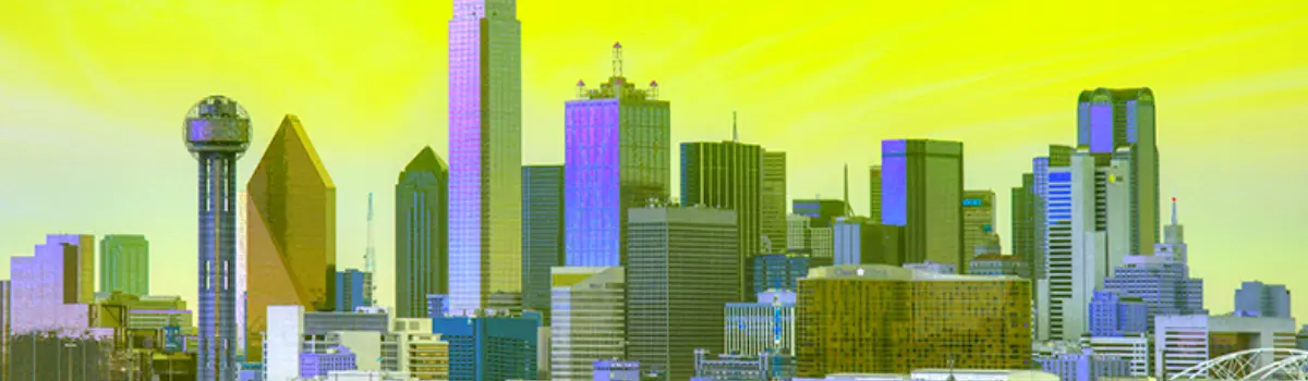 Dallas Texas skyline with a distorted neon yellow hue throughout the downtown view.