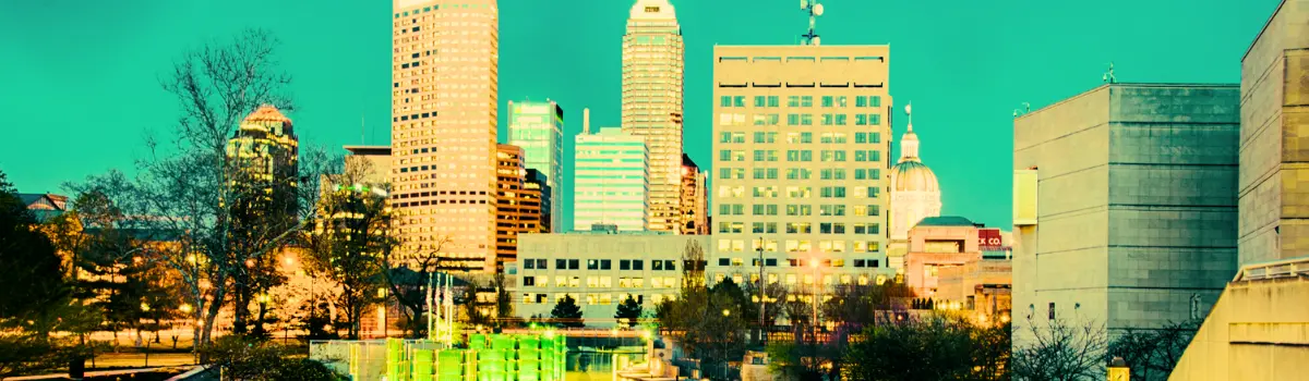 Downtown Indianapolis Indiana skyline with a turquoise hue for the sky.