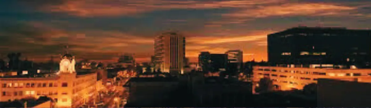 Distorted sunset image of Santa Ana skyline.